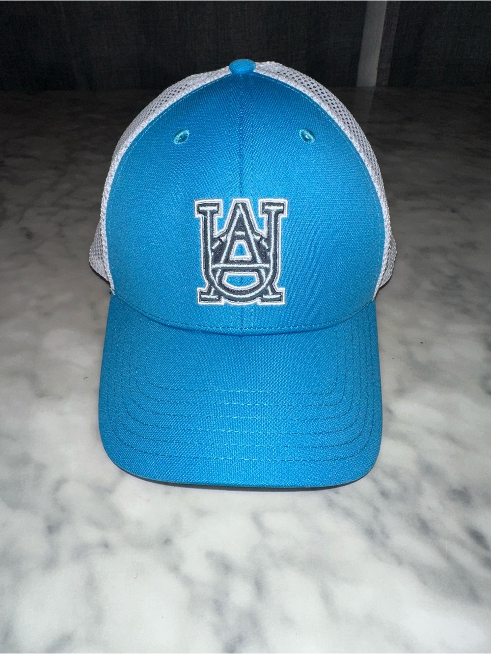 Under Armour blitzing Turquoise and White Trucker Hat with Embroidered UA Crest